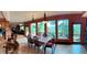 Dining room with scenic views, wood floors, and ornate lighting at 4618 Se Summit Trl, Evergreen, CO 80439