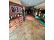 Spacious foyer with a grand staircase, tile flooring, and elegant decor at 4618 Se Summit Trl, Evergreen, CO 80439