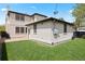Beautiful backyard with lush green grass and a fenced-in yard at 2500 S Monroe St, Denver, CO 80210