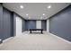 Finished basement with a pool table and carpeted floors under recessed lighting at 2500 S Monroe St, Denver, CO 80210