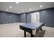 Finished basement with a pool table and carpeted floors with recessed lighting at 2500 S Monroe St, Denver, CO 80210
