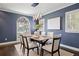 Dining room showcasing stylish decor, a dining table and modern lighting at 2500 S Monroe St, Denver, CO 80210