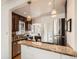 Stylish kitchen with granite countertops and stainless steel appliances at 3921 N Raleigh St, Denver, CO 80212