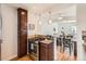 Kitchen featuring stainless steel appliances, granite counters, and access to dining area at 3921 N Raleigh St, Denver, CO 80212