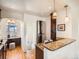 A well-appointed kitchen featuring stainless steel appliances and granite counter at 3921 N Raleigh St, Denver, CO 80212