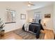 Bedroom with large windows, hardwood floors, and stylish decor at 3921 N Raleigh St, Denver, CO 80212