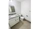 Small bathroom with granite countertop and white vanity at 2500 S Victor St # A, Aurora, CO 80014