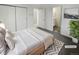 Virtually staged bedroom with ensuite bathroom and closet at 2500 S Victor St # A, Aurora, CO 80014