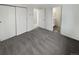 Spacious bedroom with carpet and access to a full bath at 2500 S Victor St # A, Aurora, CO 80014