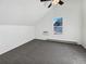 Spacious bedroom with grey carpet, ceiling fan and large window at 2500 S Victor St # A, Aurora, CO 80014
