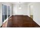 Bright dining room with hardwood floors and sliding glass doors at 2500 S Victor St # A, Aurora, CO 80014