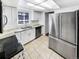 Modern kitchen with stainless steel appliances and granite countertops at 2500 S Victor St # A, Aurora, CO 80014