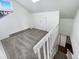 Spacious loft area with grey carpet and skylight at 2500 S Victor St # A, Aurora, CO 80014