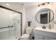 Bathroom featuring a glass-enclosed shower and modern fixtures at 10731 E 151St Pl, Brighton, CO 80602
