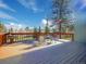 Private deck boasts seating, patio furniture, fountain, and mountain views at 8473 Gray Fox Dr, Evergreen, CO 80439
