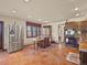 Spacious kitchen features stainless steel appliances, large island, and ample cabinet space at 8473 Gray Fox Dr, Evergreen, CO 80439