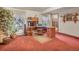 Home office with large windows, built-in desk and storage at 8473 Gray Fox Dr, Evergreen, CO 80439
