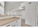 Open floor plan kitchen counter leading into a bright and open dining room at 18761 E Water Dr # F, Aurora, CO 80013