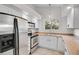 Bright kitchen with stainless appliances, and ample counter space at 18761 E Water Dr # F, Aurora, CO 80013