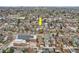 Aerial view showing the home's location in a well-established neighborhood with nearby amenities at 1824 S Logan St, Denver, CO 80210