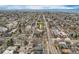 Aerial view of the property and its proximity to neighborhood amenities and tree lined street at 1824 S Logan St, Denver, CO 80210