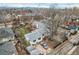 Aerial view showcasing the home's backyard, parking, and location in a quiet neighborhood at 1824 S Logan St, Denver, CO 80210