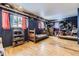 Cozy bedroom with built-in shelving and bright window accents at 1824 S Logan St, Denver, CO 80210