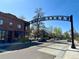 Street level view of the South Pearl Street neighborhood welcome sign at 1824 S Logan St, Denver, CO 80210