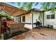 Charming backyard patio with hot tub, barbecue, and outdoor seating, perfect for relaxing and entertaining at 4968 Alcott St, Denver, CO 80221