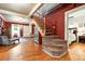 Elegant foyer with hardwood floors, staircase, and view of the bedroom at 4968 Alcott St, Denver, CO 80221