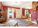 Beautiful living room featuring large windows, hardwood floors and stylish decor at 4968 Alcott St, Denver, CO 80221