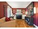 Bright living room with fireplace, hardwood floors, complemented by decorative accents at 4968 Alcott St, Denver, CO 80221