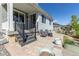Landscaped backyard featuring a patio with seating at 9843 Rosalee Peak St, Littleton, CO 80125
