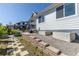 Beautiful backyard with a stone path and manicured lawn at 9843 Rosalee Peak St, Littleton, CO 80125