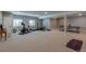 Spacious basement with workout area, offering ample space for fitness and recreation at 9843 Rosalee Peak St, Littleton, CO 80125