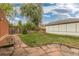 Landscaped backyard with a grassy lawn at 1545 Newport St, Denver, CO 80220