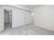 Spacious basement bedroom with neutral carpeting and a large closet at 1545 Newport St, Denver, CO 80220