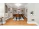 Dining room with hardwood floors and built-ins at 1545 Newport St, Denver, CO 80220