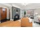 Living room with fireplace and hardwood floors at 1545 Newport St, Denver, CO 80220