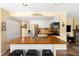 Kitchen featuring a wooden island, white cabinetry, and stainless steel appliances at 19716 Glendale Ln, Parker, CO 80134