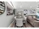 Comfortable dining and living area with modern furnishings, creating an inviting space for gatherings and relaxation at 6409 Brentwood St, Arvada, CO 80004