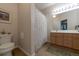Well-maintained bathroom with a shower featuring neutral color and modern finishes at 8338 S Independence Cir # 108, Littleton, CO 80128