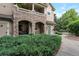 Charming townhome featuring a stone-accented front facade and well-kept landscaping at 8338 S Independence Cir # 108, Littleton, CO 80128