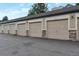 Row of individual garages with stone accents; ample parking at 8338 S Independence Cir # 108, Littleton, CO 80128