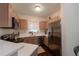 Cozy kitchen featuring stainless steel appliances and a bright window at 8338 S Independence Cir # 108, Littleton, CO 80128