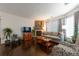 Comfortable living room with fireplace and ample natural light at 8338 S Independence Cir # 108, Littleton, CO 80128