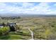 Aerial shot of community showcasing walking trails, open space, and gorgeous mountain views at 13804 Quail Ridge Dr, Broomfield, CO 80020