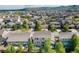 Residential area with lots of similar single Gathering houses and some green trees at 15389 W 50Th Dr, Golden, CO 80403