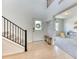 Welcoming entryway leading to a bright playroom with built-in storage at 15389 W 50Th Dr, Golden, CO 80403