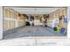 Spacious, well-organized garage with ample storage, shelving, and a clean, modern interior at 15389 W 50Th Dr, Golden, CO 80403